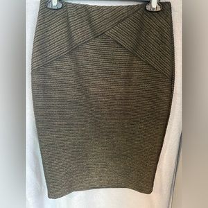 Gliter’ish.  Pencil skirt. Fitted.